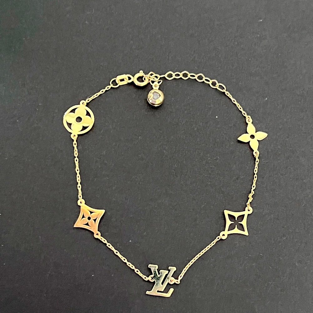 LV 585 stamp gold bracelet
